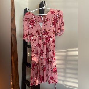 Pink floral dress with waist band and white lace detailing